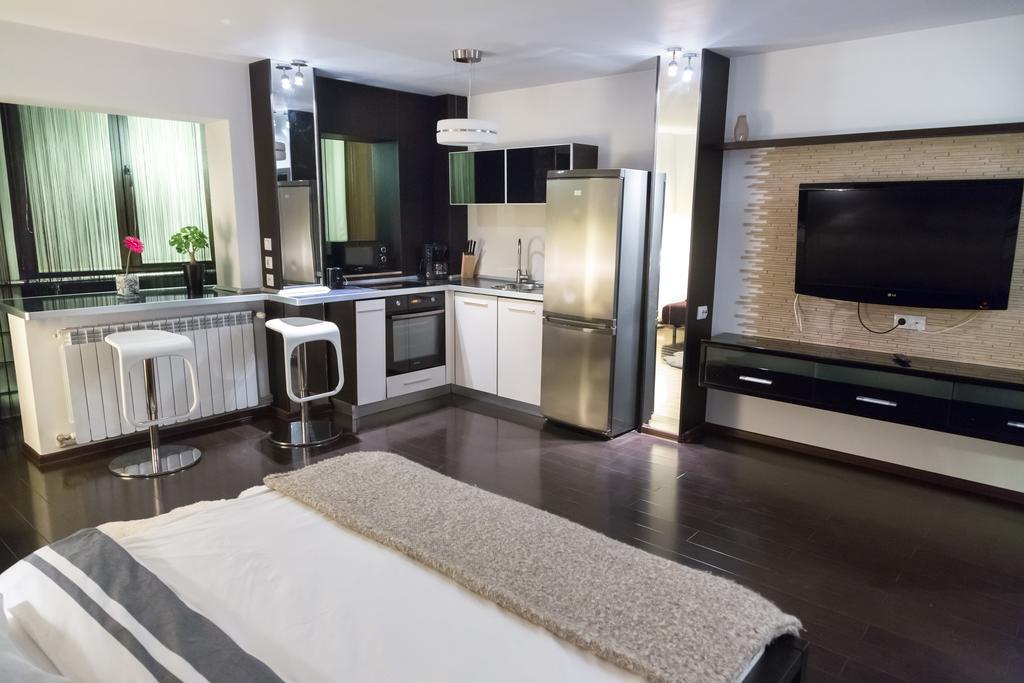 Studio G By Mrg Apartments Бухарест Номер фото